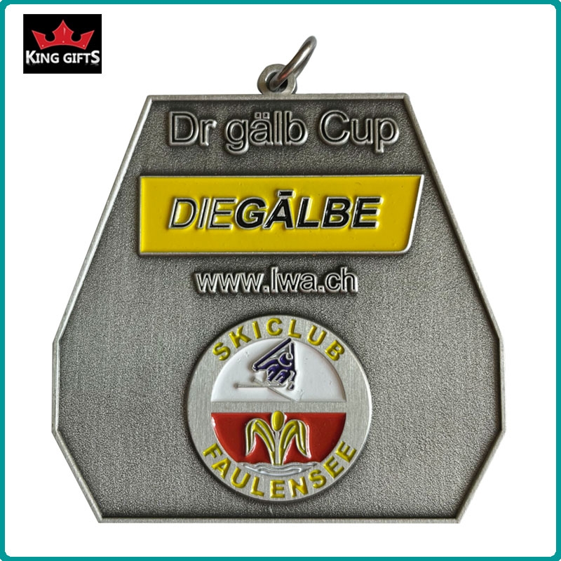 B001 - 2D medal with soft enamels and different plated finishes